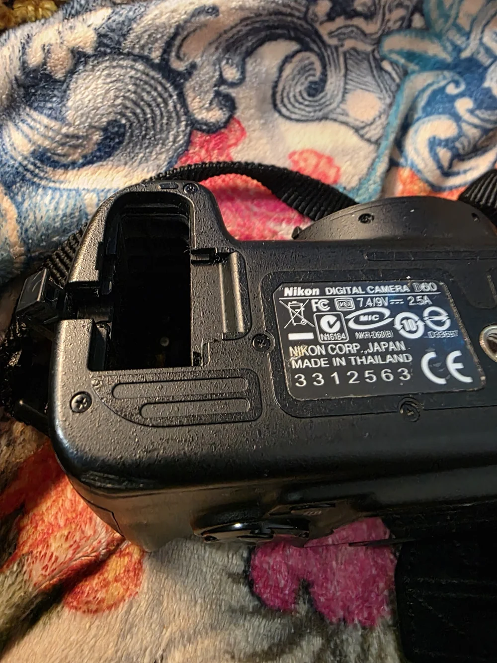 Nikon DSLR Camera Body with Black 18-55mm Lens and Black/Yellow Strap
